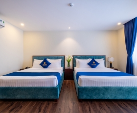 Phòng Grand Deluxe Twin City View | Sandals Camellia Đà Lạt